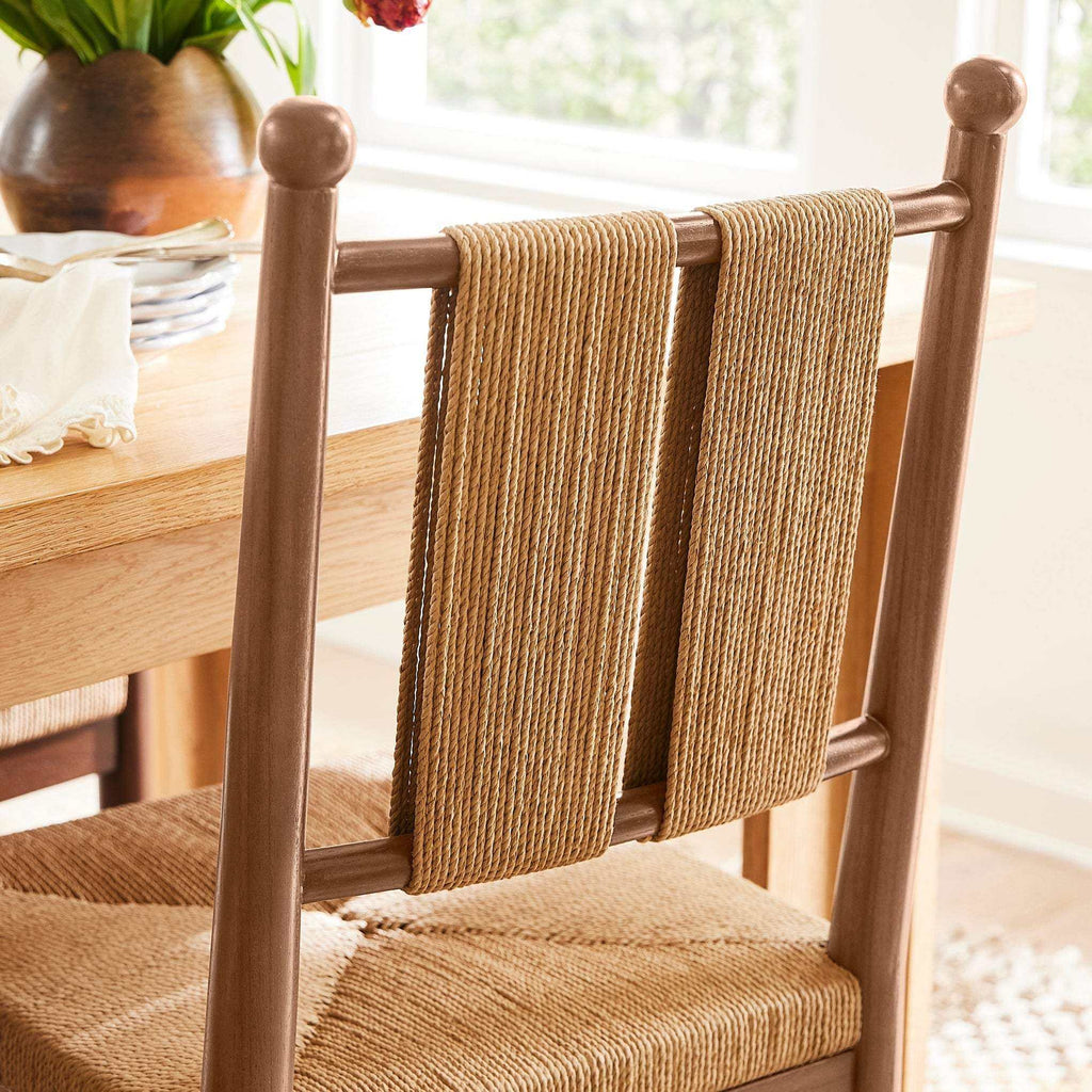 Estela Dining Chair with warm brown solid wood frame and hand-woven tan cord back and rush-pattern seat