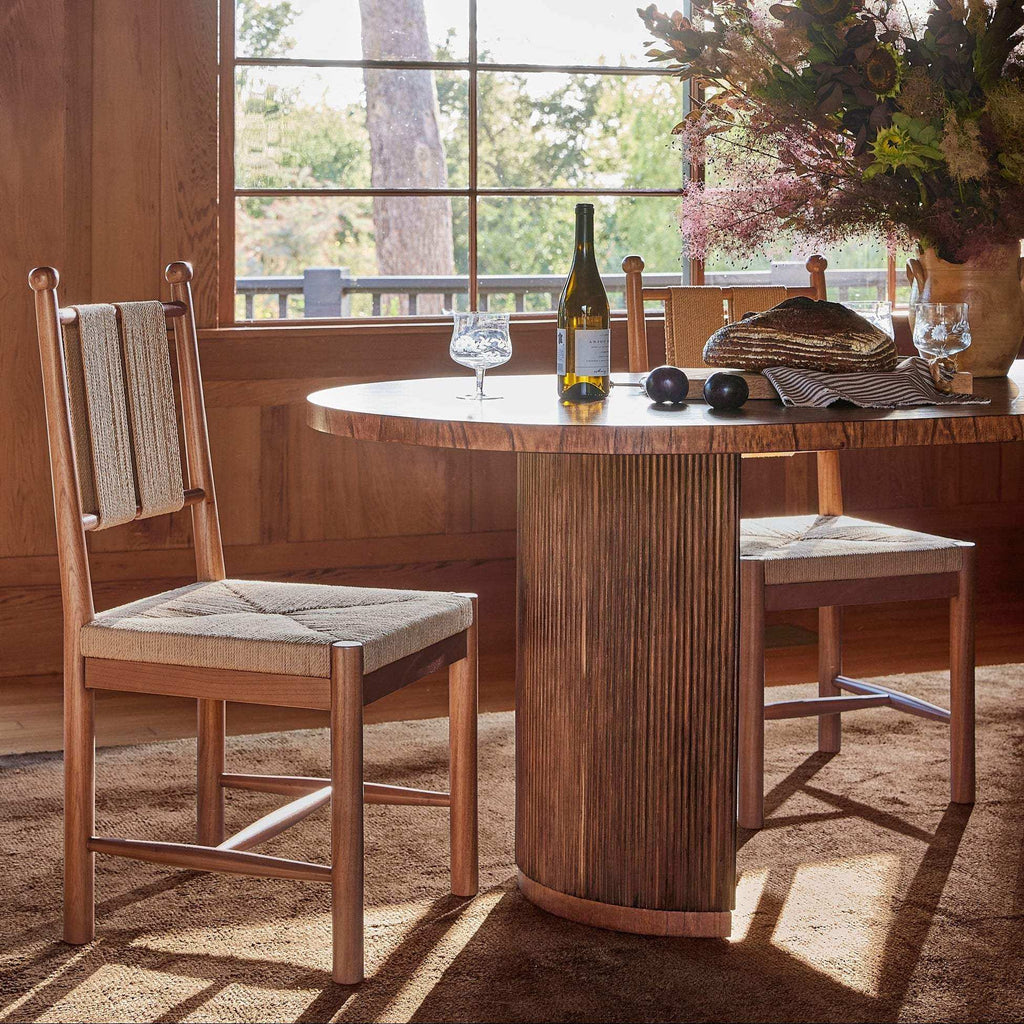 Estela Dining Chair in warm wood with woven cord back and textured rush seat