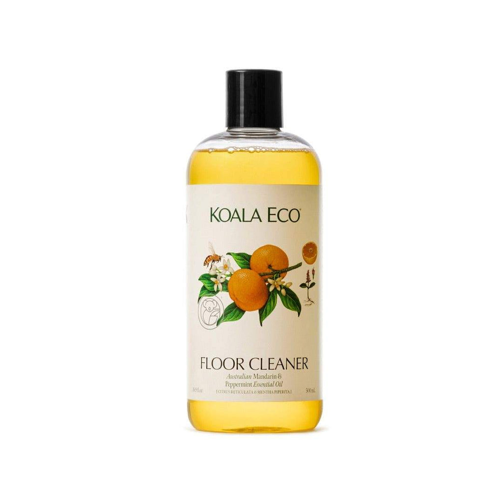 Floor Cleaner - Mandarin + Peppermint in a clear bottle with golden liquid, black cap and citrus fruit label