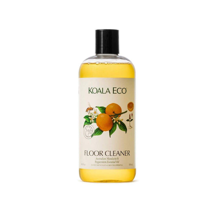Floor Cleaner - Mandarin + Peppermint in a clear bottle with golden liquid, black cap and citrus fruit label