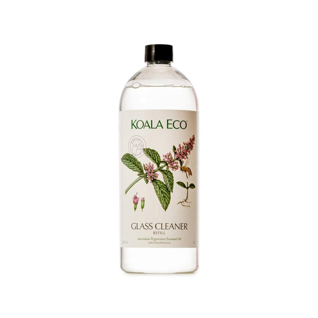 Glass Cleaner in a clear plastic bottle with black cap, botanical peppermint label, and transparent liquid