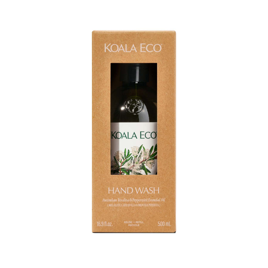 Hand Wash - Apothecary Glass in a dark reusable bottle with a black pump, botanical label, and kraft cardboard box.