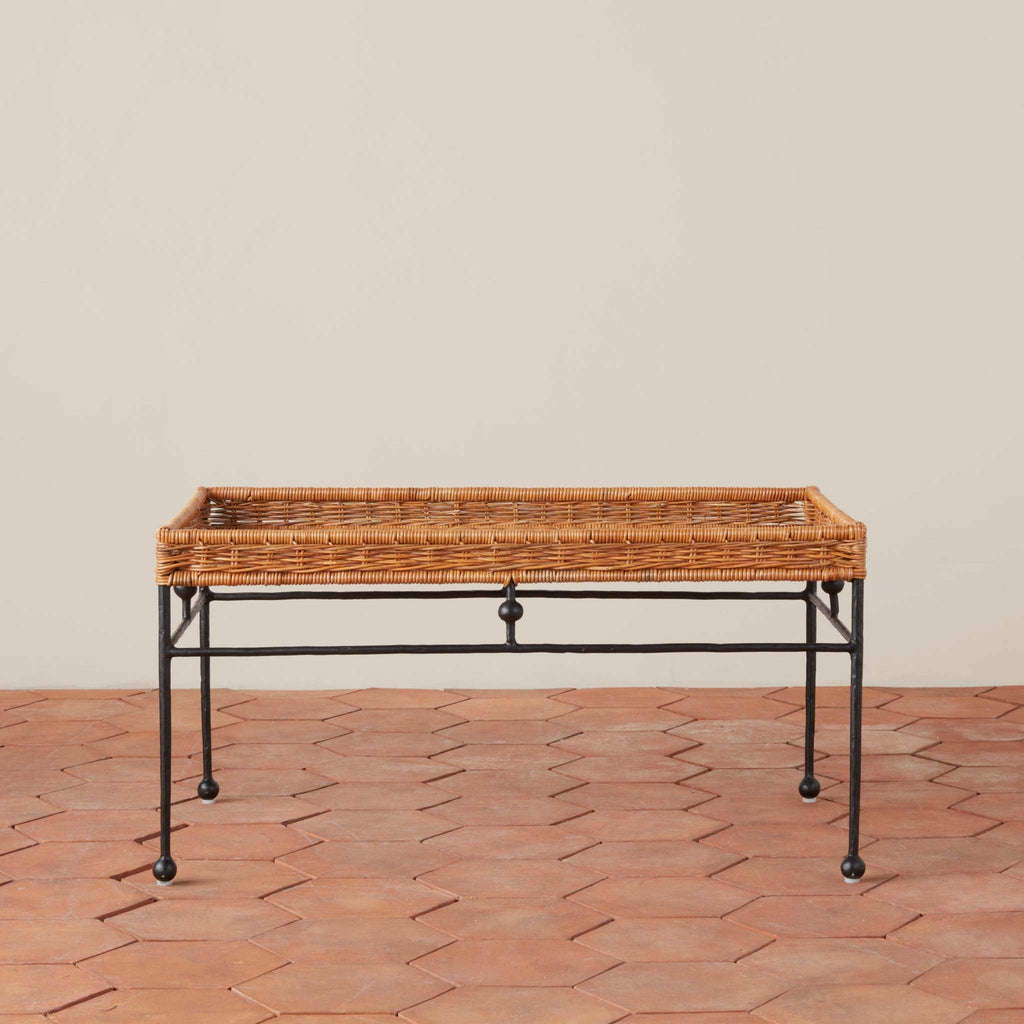 Lacoste indoor outdoor wicker coffee table with tray top and rounded feet