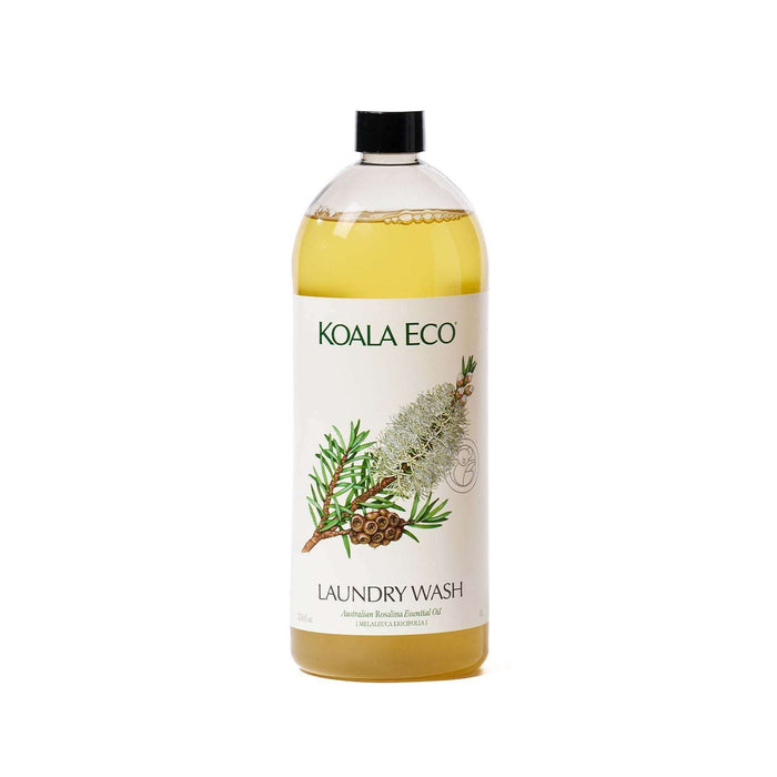 Laundry Wash - Lavender in a clear bottle with golden liquid, a white label and botanical rosalina illustrations