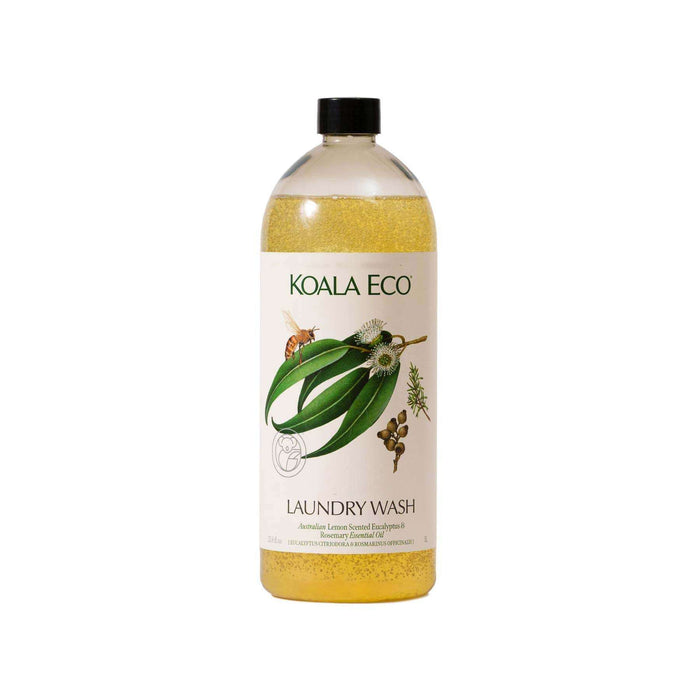 Laundry Wash - Lemon-Scented Eucalyptus in a clear bottle with golden liquid, black cap, and green botanical label