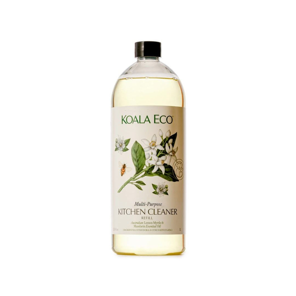 Multi-Purpose Kitchen Cleaner refill in a clear bottle with pale yellow liquid, black cap and botanical floral label