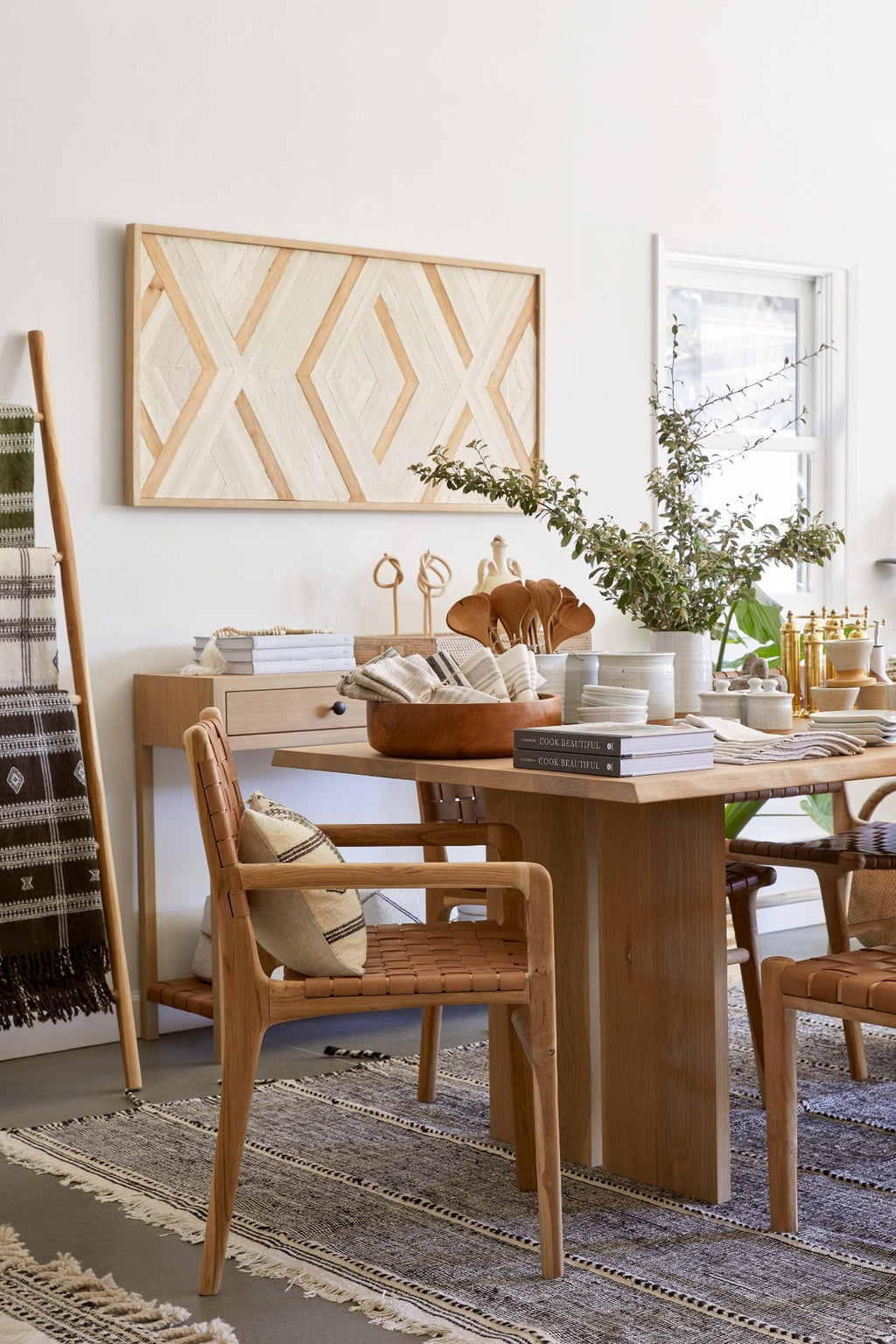 Geometric wood piece wall art with neutral tones in modern dining room interior