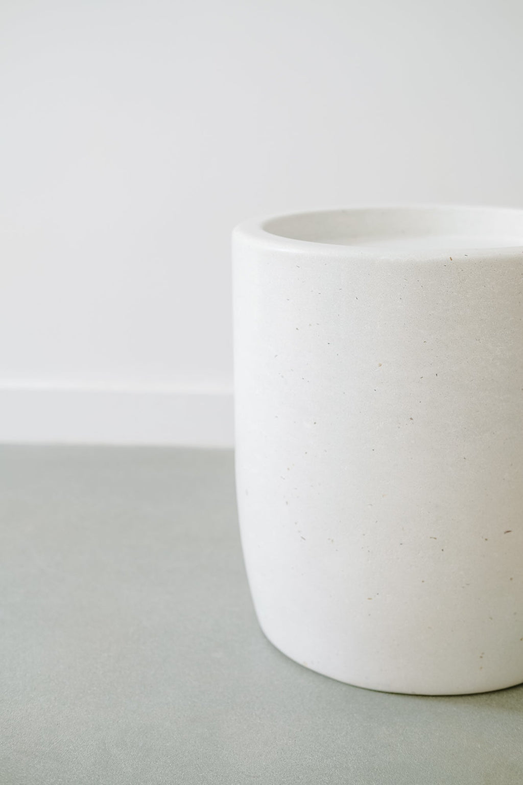 Minimalist white Abalone Terrazzo Side Table with smooth terrazzo finish and subtle abalone shell flecks.