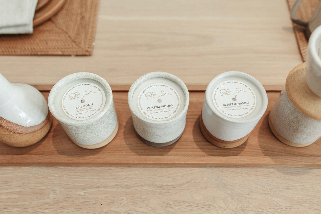 Uzumati Ceramic Bali Moon Candle in handcrafted glazed stoneware vessel on wooden surface