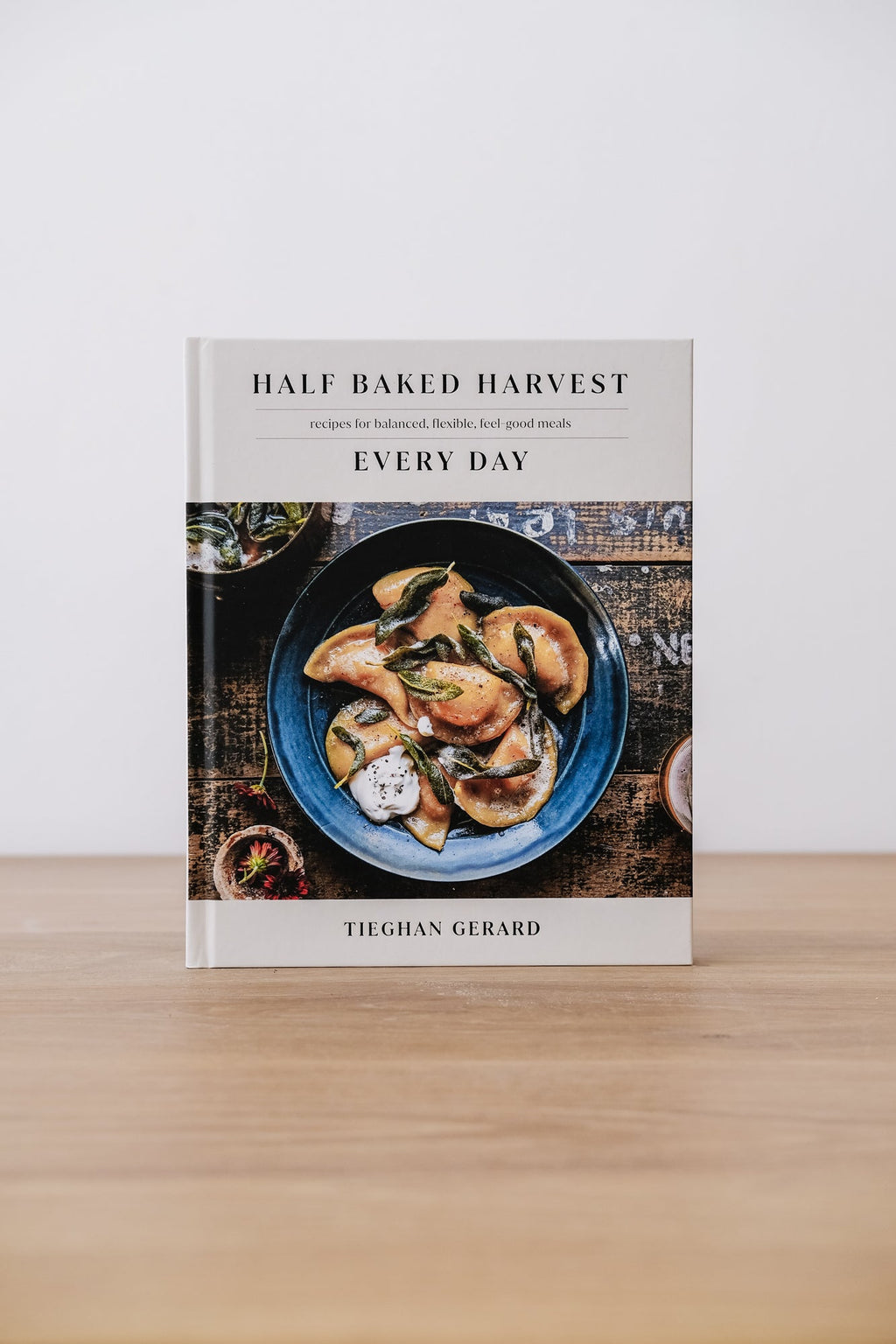 Half Baked Harvest Every Day cookbook by Tieghan Gerard on wooden table