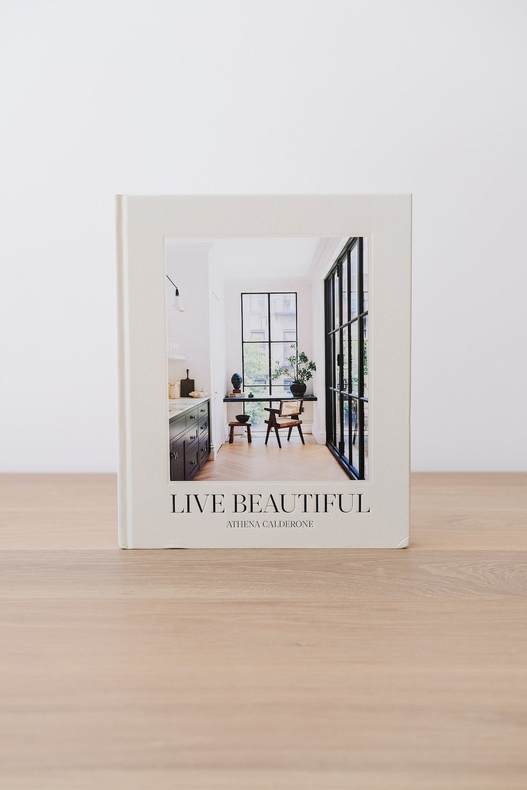 Live Beautiful book by Athena Calderone with elegant interior design on cover