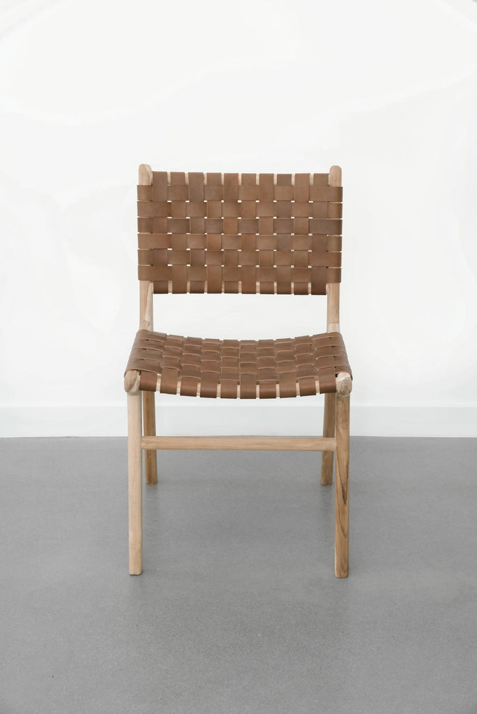 Front view of our Woven Leather Strap Dining Chair - Saddle. Handmade in Bali with Teak wood and vegetable-tanned leather imported from Java. - Saffron and Poe
