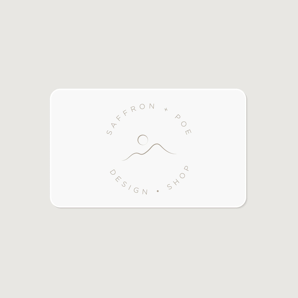 Minimalist Saffron + Poe gift card with simple circular logo design on light background
