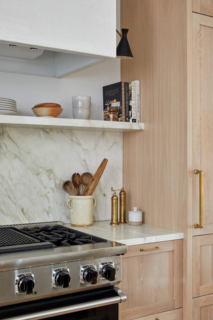 Styled Atlas Brass Grinders in a kitchen with a Hanselmann Hand Thrown Sugar Jar and a Vintage Italian Confit Pot. - Saffron and Poe