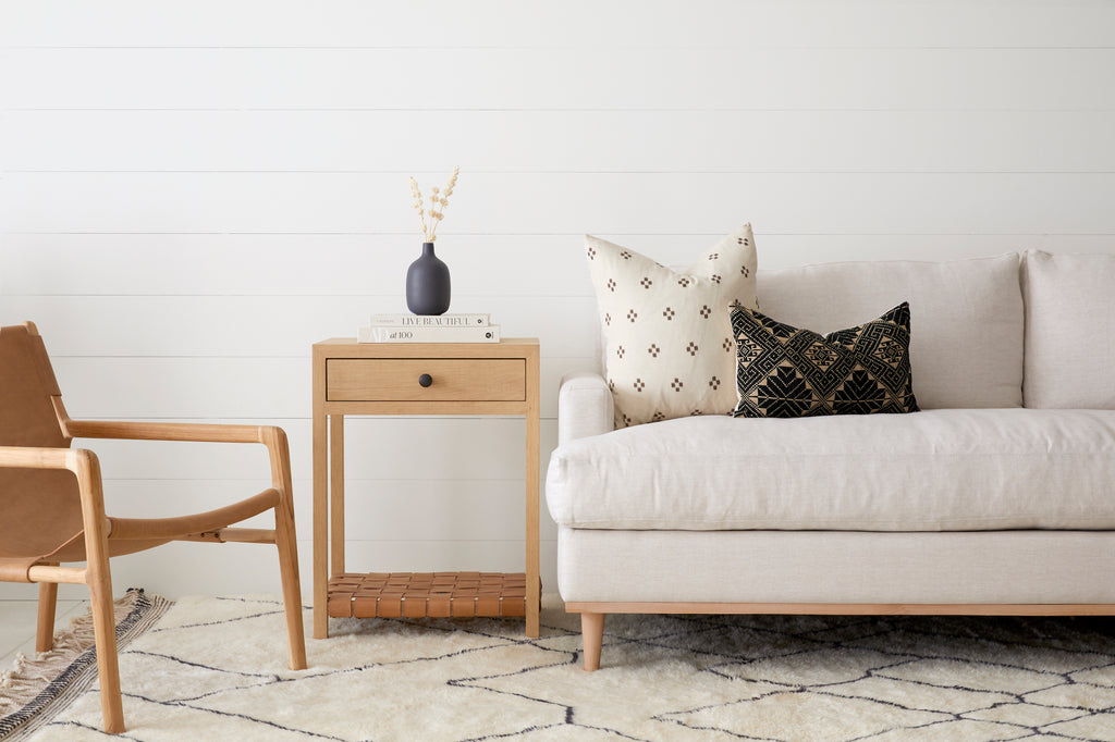 Styled Oak and Leather Strap Side Table with Linen and Teak Sofa on a Beni Ourain Rug. Handcrafted in California. - Saffron + Poe