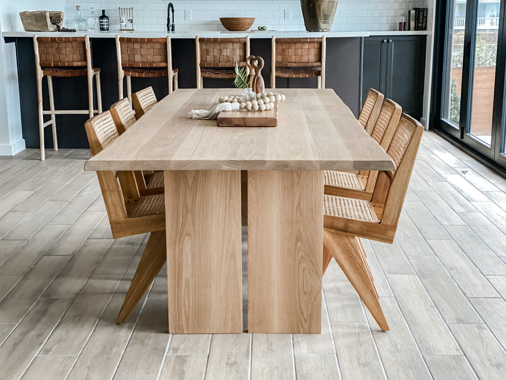 Styled side view of White Oak Live Edge Table with Woven Leather Strap Bar Stools - Saddle in a beautiful kitchen. - Saffron and Poe