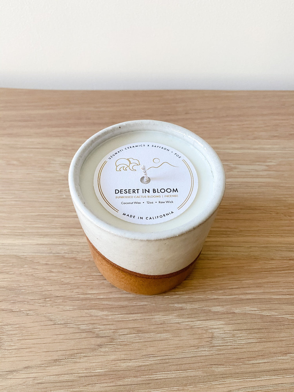Uzumati Ceramic Desert in Bloom candle with hand-glazed stoneware vessel and floral desert scent